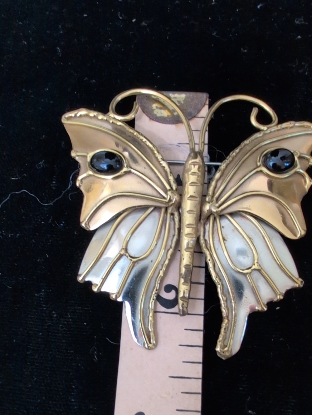 Gold-Tone Butterfly Brooch with White Enamel and Black Accents